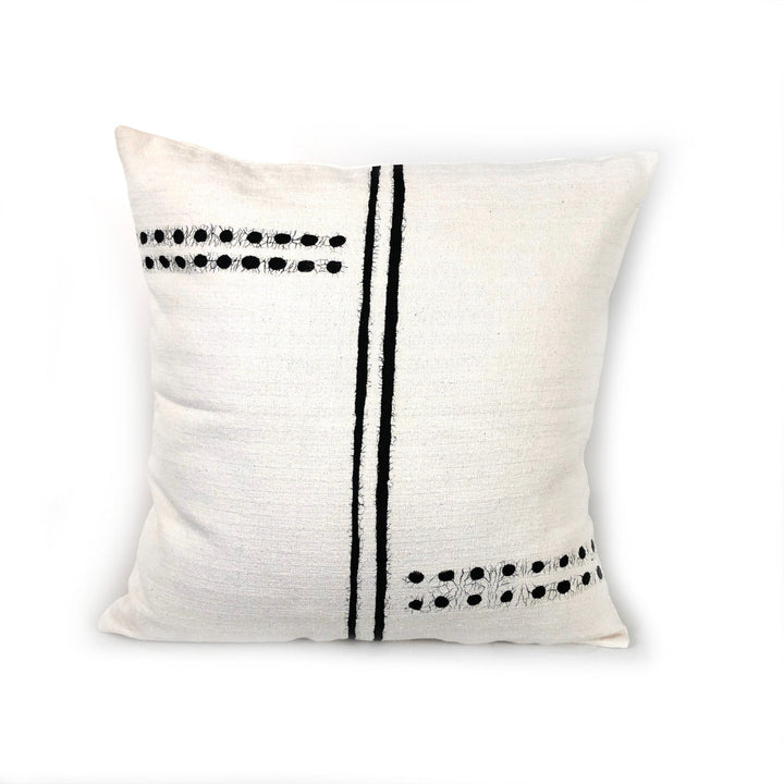 White cotton sadza pillow cover with a hand-painted dots-and-lines pattern, handwoven in Zimbabwe.