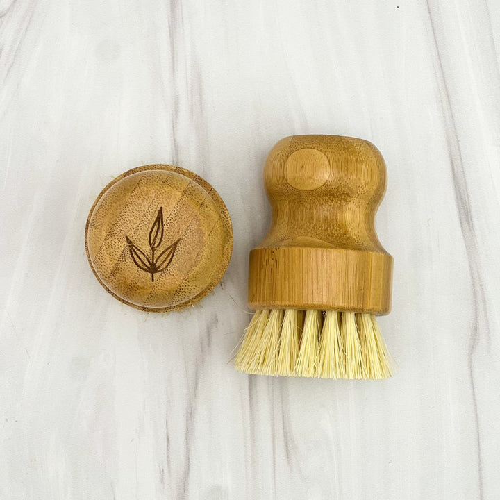 Bamboo pot brush with natural sisal bristles, a compostable kitchen brush.