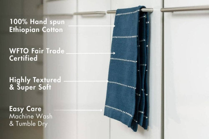 Cotton tea towel, 16 by 26 inches, natural fiber only.