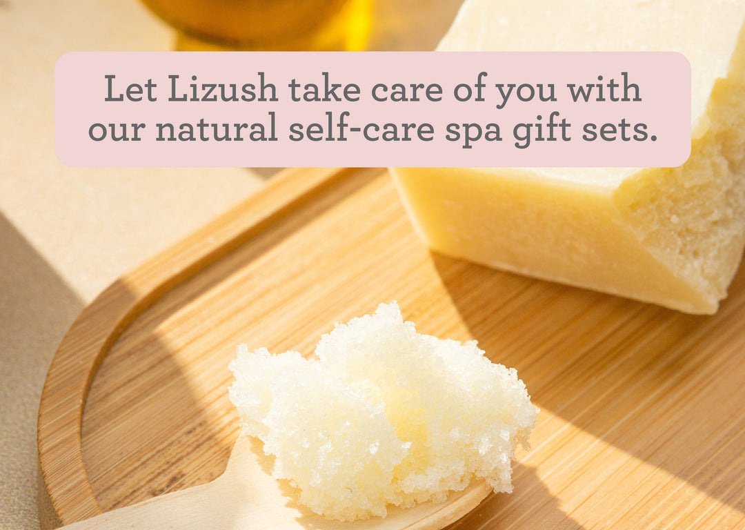Grapefruit and shea butter body care gift set with a body cream jar and body scrub.