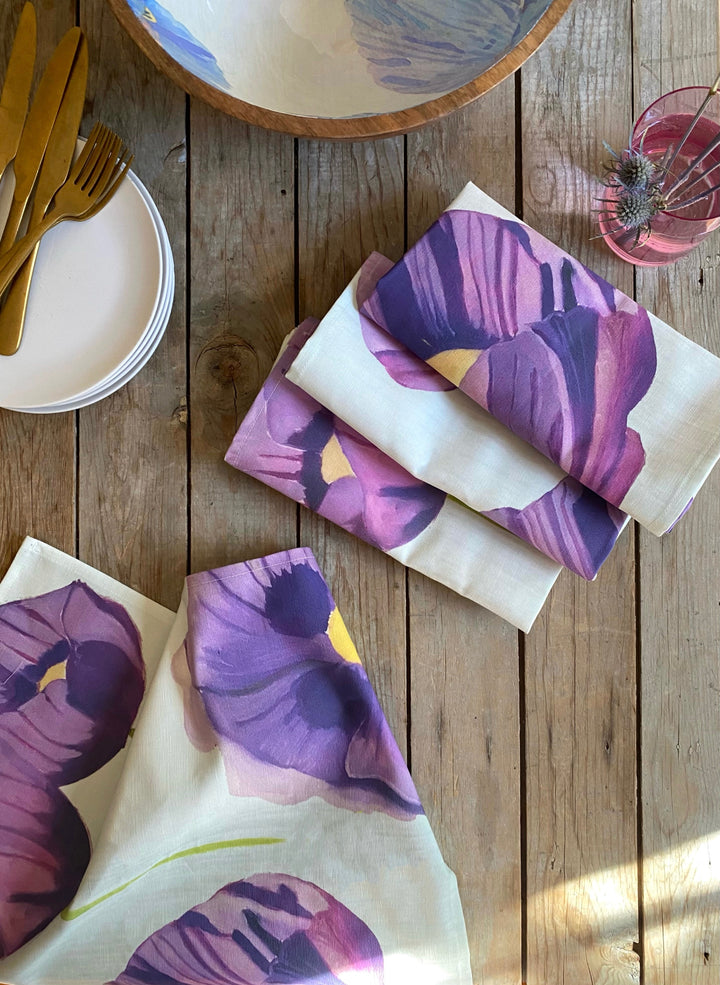 Purple poppies linen napkin set in heavyweight fabric, shown folded.