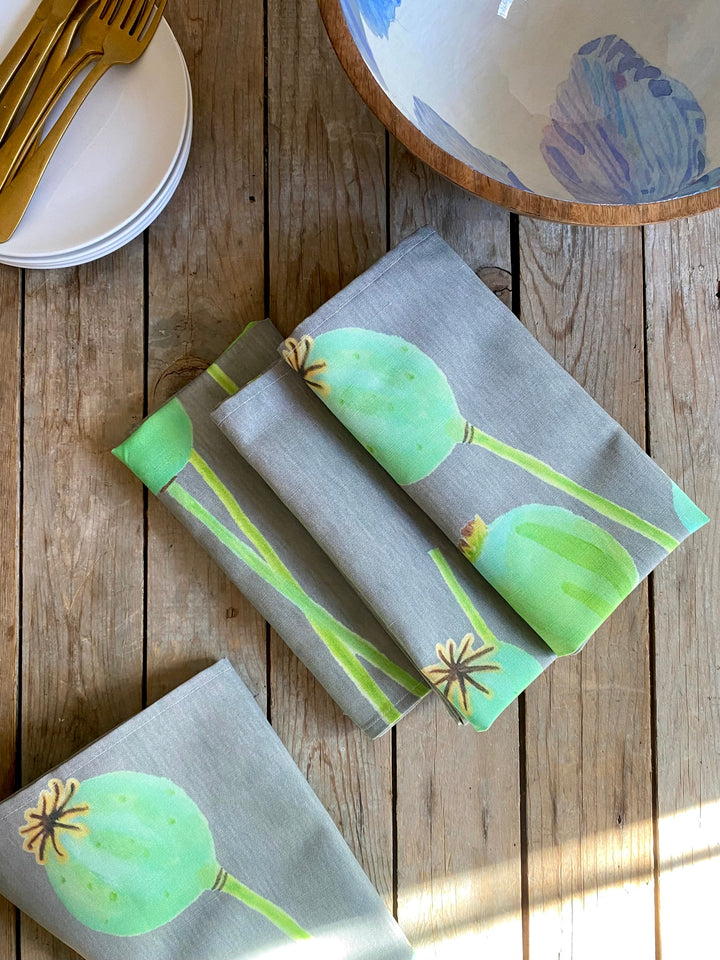 Linen-cotton poppy pods napkin set with a floral pattern.