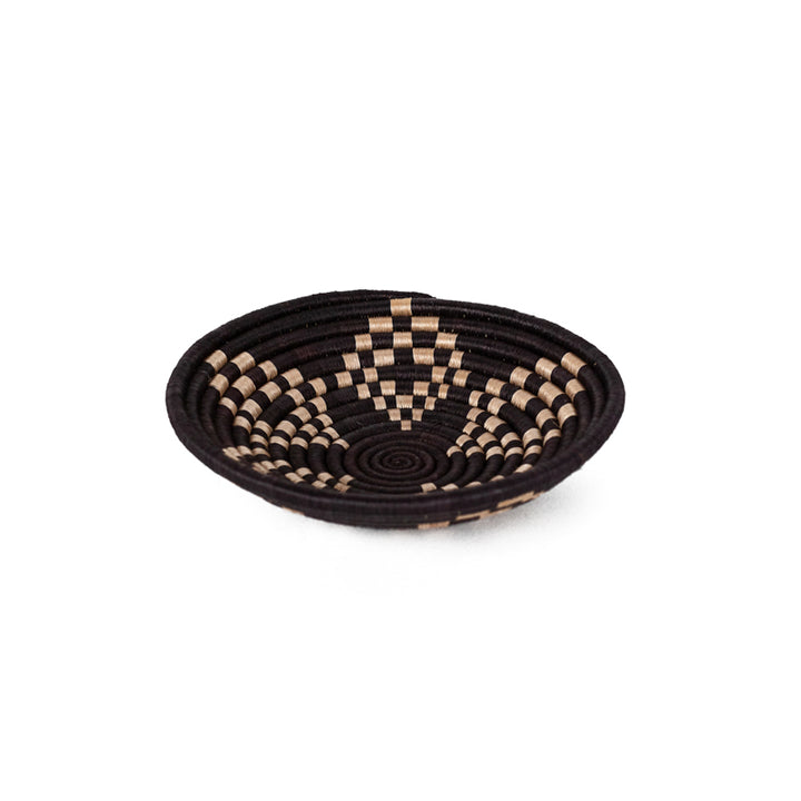 Bariku woven bowls in black and tan sisal with a smooth woven interior.