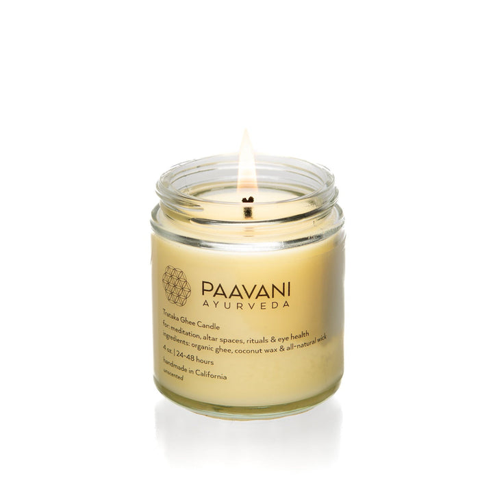 Organic ghee trataka meditation candle with a wooden wick.