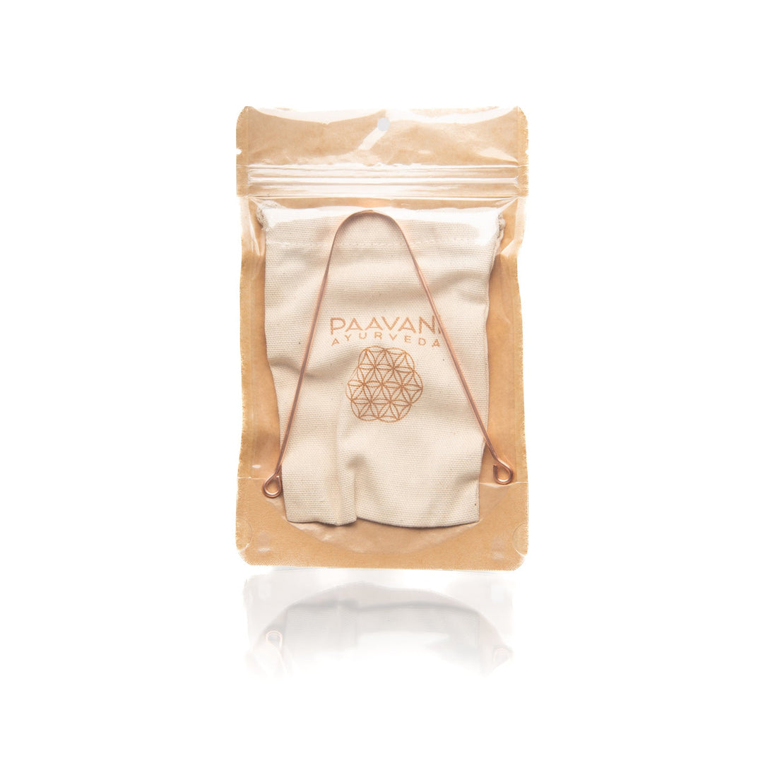 Copper tongue cleaner with a polished handle and scraping surface.