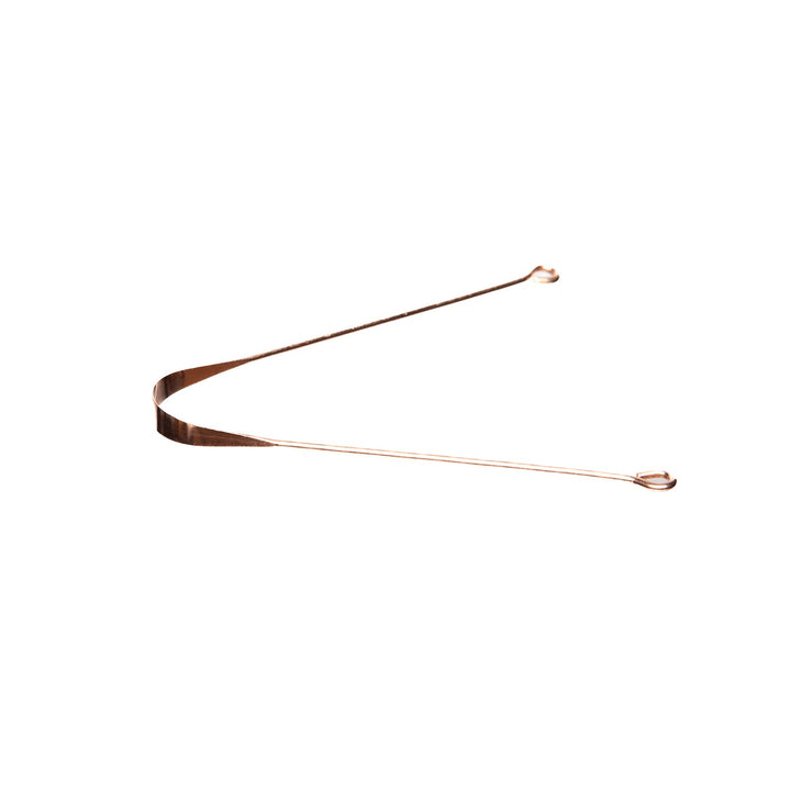Copper tongue cleaner for the Ayurvedic morning routine, with a copper handle.