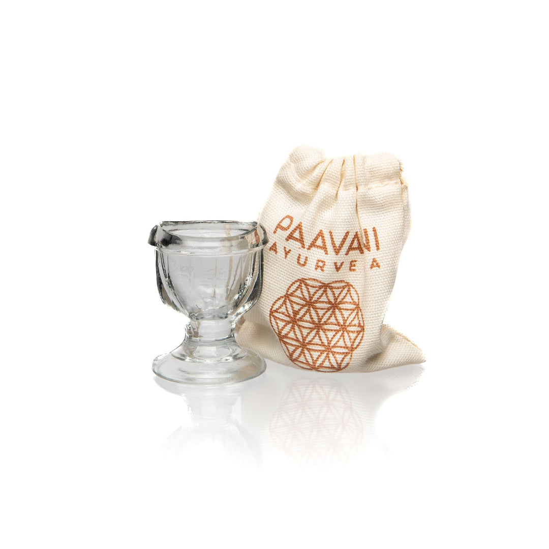 Glass eye wash cup for the traditional Ayurvedic eye-washing practice.