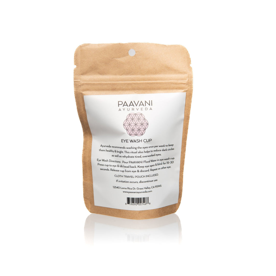 Clear glass eye wash cup for the Ayurvedic eye-washing practice.