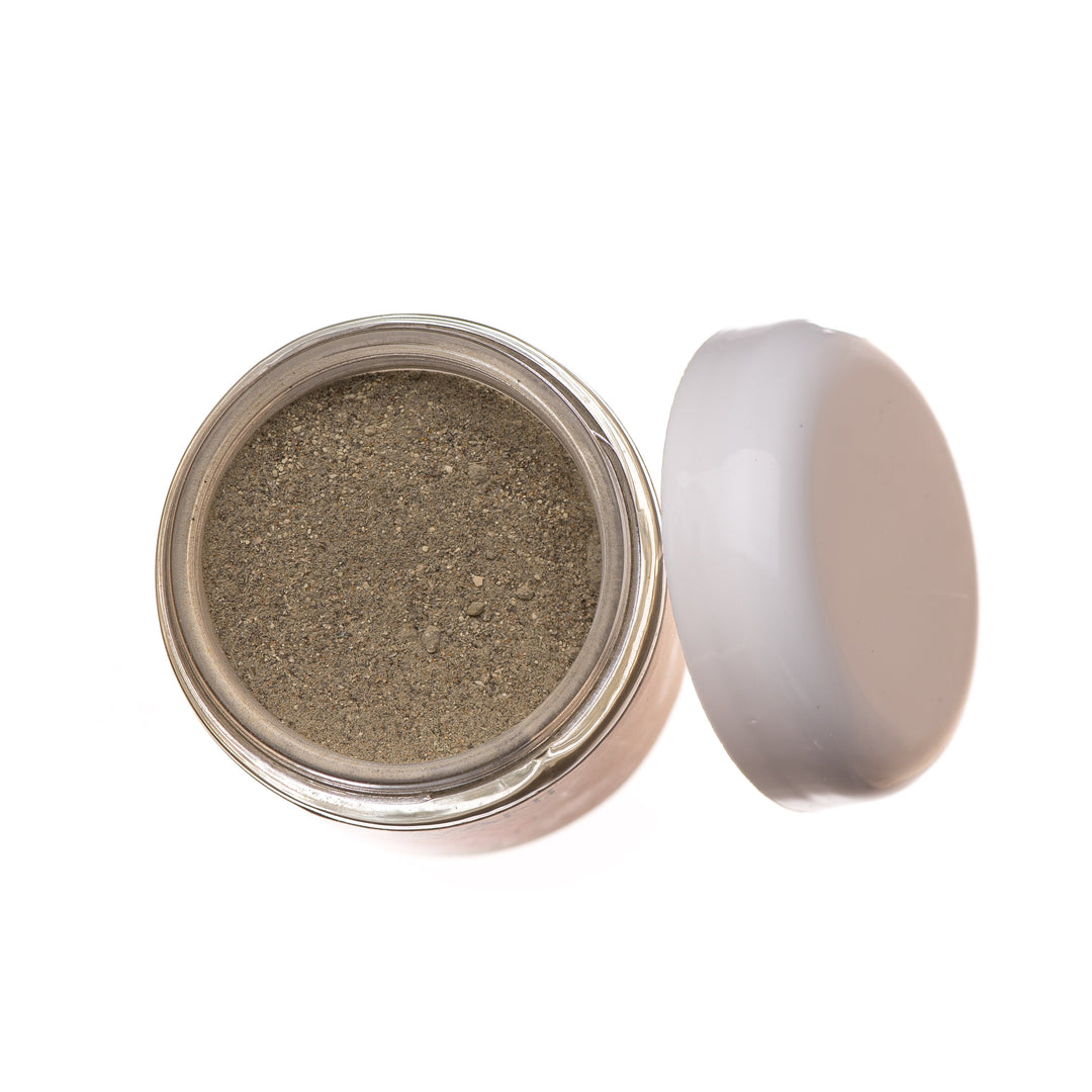 Kapha cleanser and mask with French green clay in skincare jars.