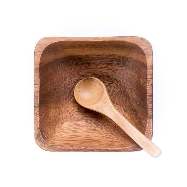 Bamboo and acacia facial mixing bowl and spoon for blending masks.