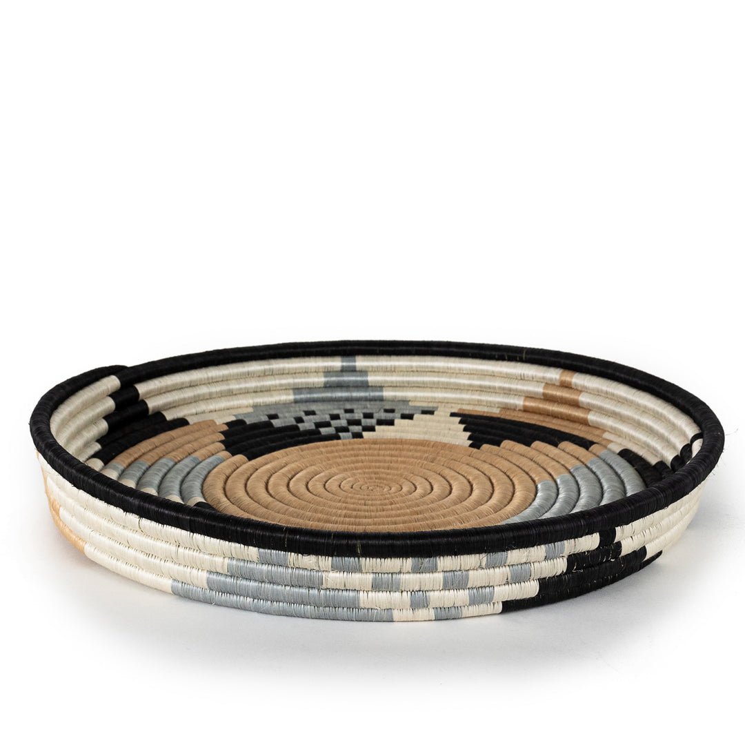 Side view of a large Boutique Diversiform woven bowl in cool gray multi-tone sisal.
