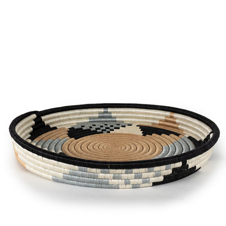 Side view of a large Boutique Diversiform woven bowl in cool gray multi-tone sisal.