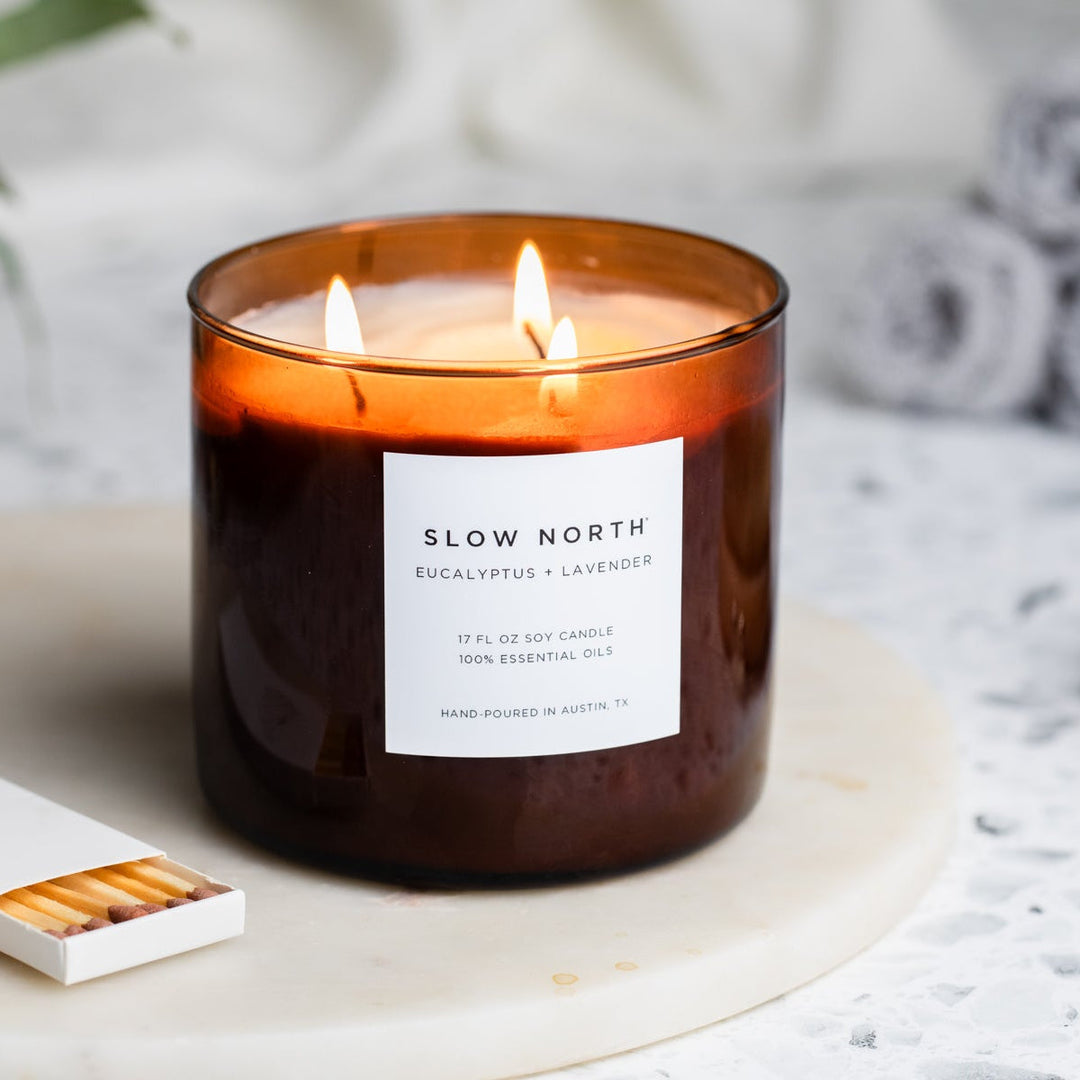 Eucalyptus Lavender three-wick soy candle in a glass jar with natural wax.