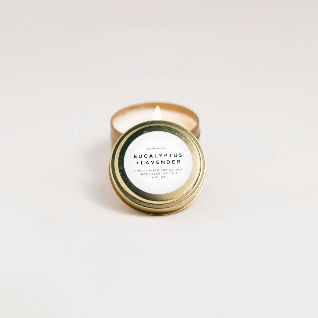 Eucalyptus lavender travel tin candle with calming herbal scent and label.