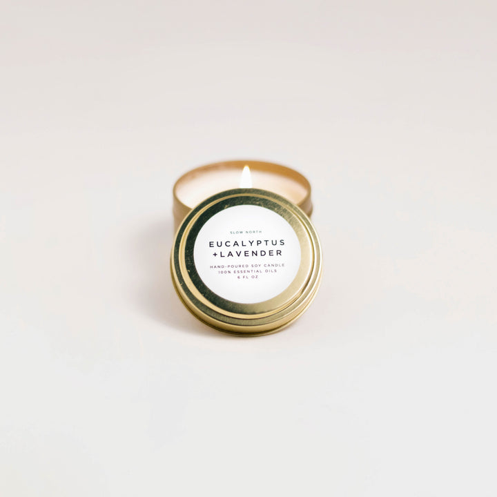 Eucalyptus lavender travel tin candle with calming herbal scent and label.