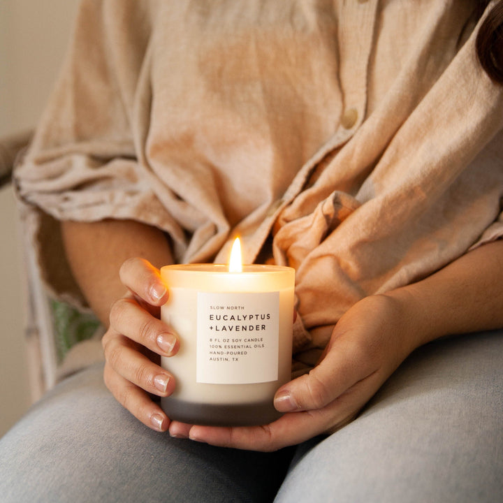 8 oz eucalyptus lavender candle with essential oil blend and soft flame.