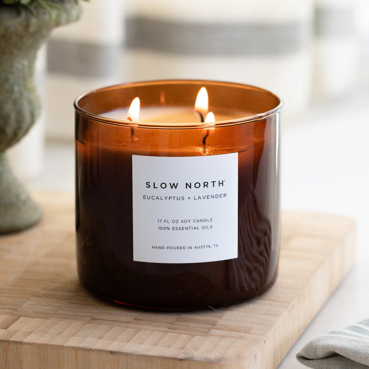Eucalyptus Lavender three-wick soy candle in a glass jar.
