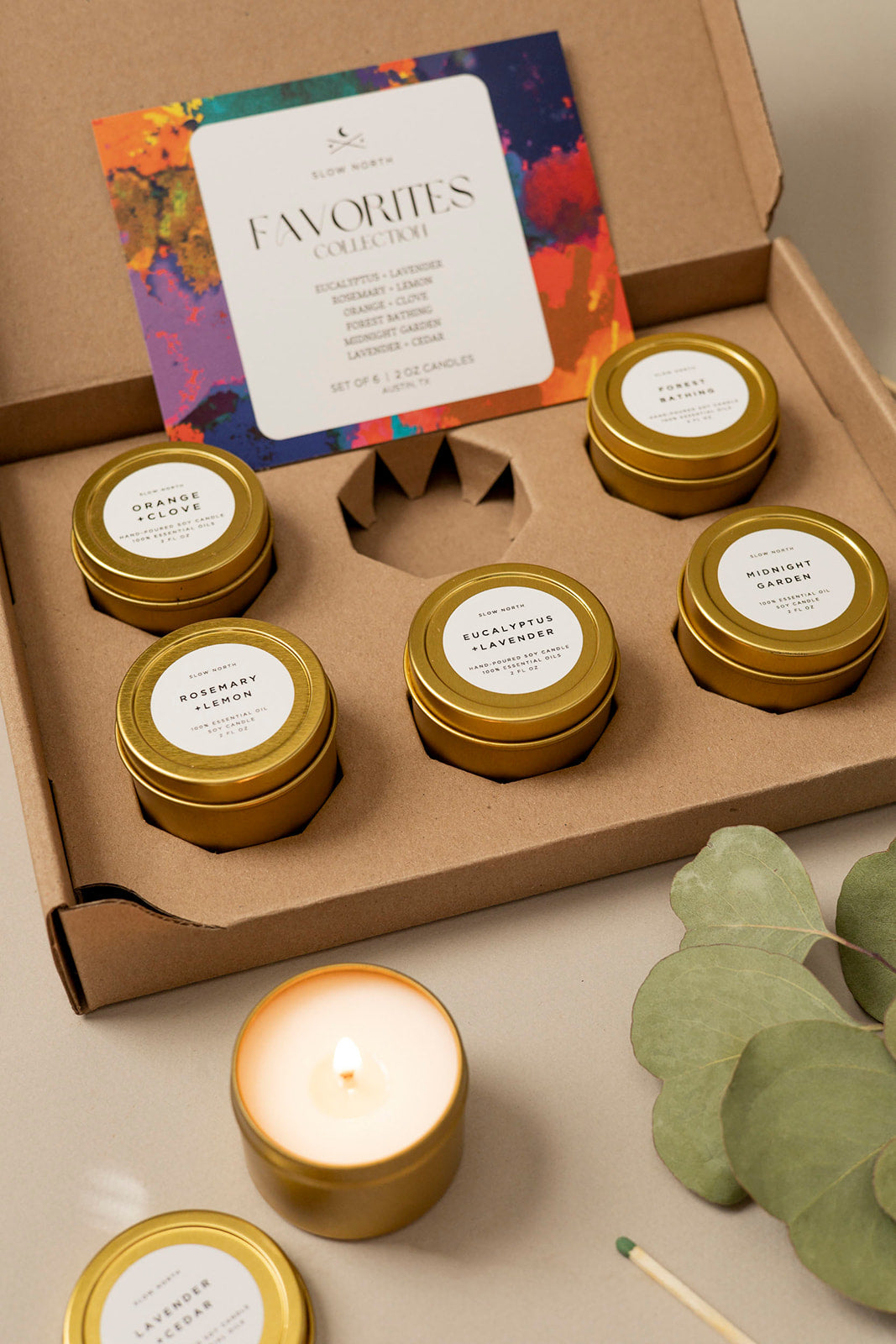 Set of six mini tin candles from the Favorites Collection in small tins.