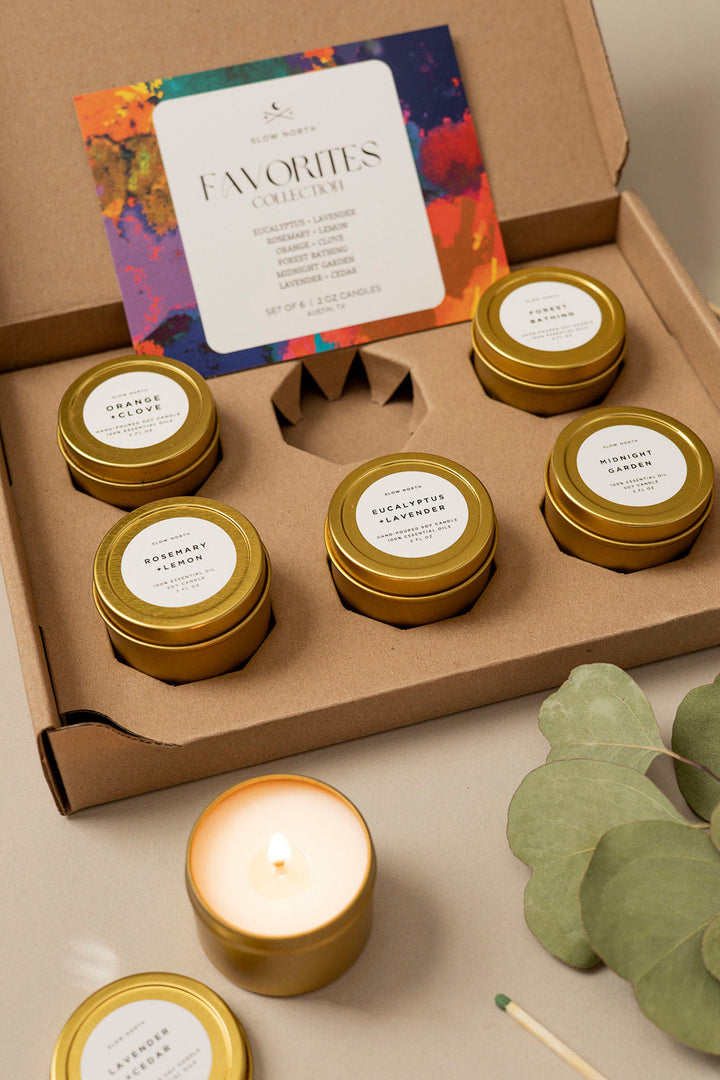 Set of six mini tin candles from the Favorites Collection in small tins.
