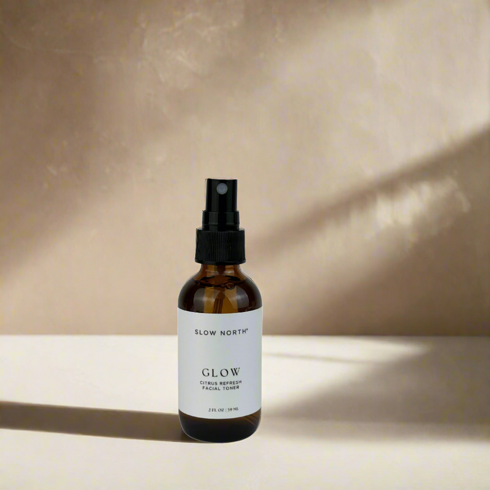 Citrus facial toner with vitamin C in a glass bottle with botanical label.