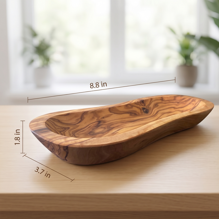 Mediterranean olive wood bowl, showcasing a smooth, multi-purpose design with natural wood grain details.