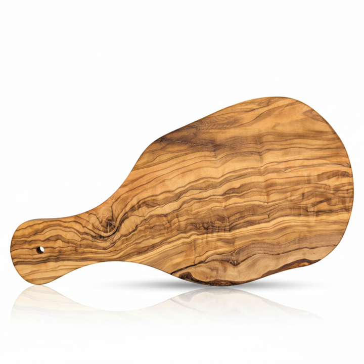 Olive wood cutting board with a Mediterranean handle, showing a smooth surface and natural wood grain detail.