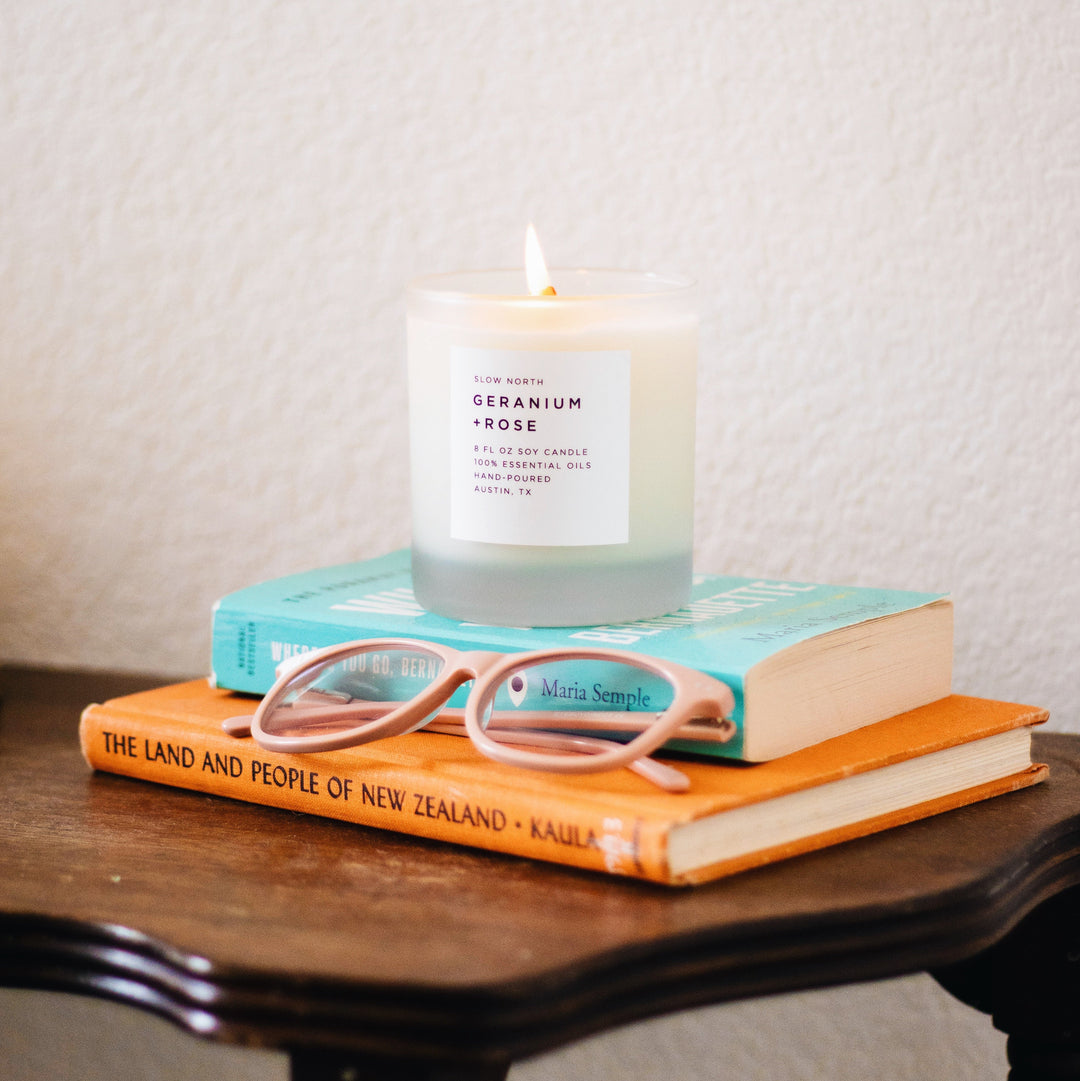 8 oz Geranium Rose signature candle with soy wax in a clear glass jar.