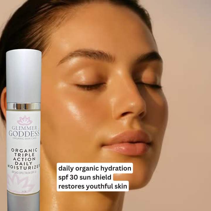 DC-Glimmer Goddess Triple Action Daily Organic Face Moisturizer with SPF 30, shown in a sleek bottle with natural ingredients.