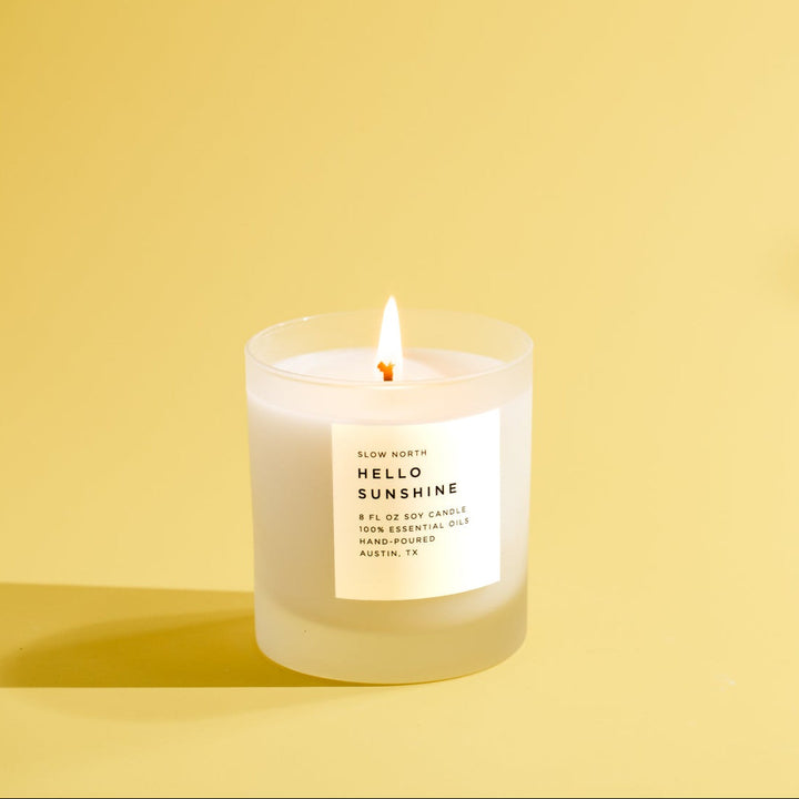 Hello Sunshine candle with citrus blend in a glass vessel.
