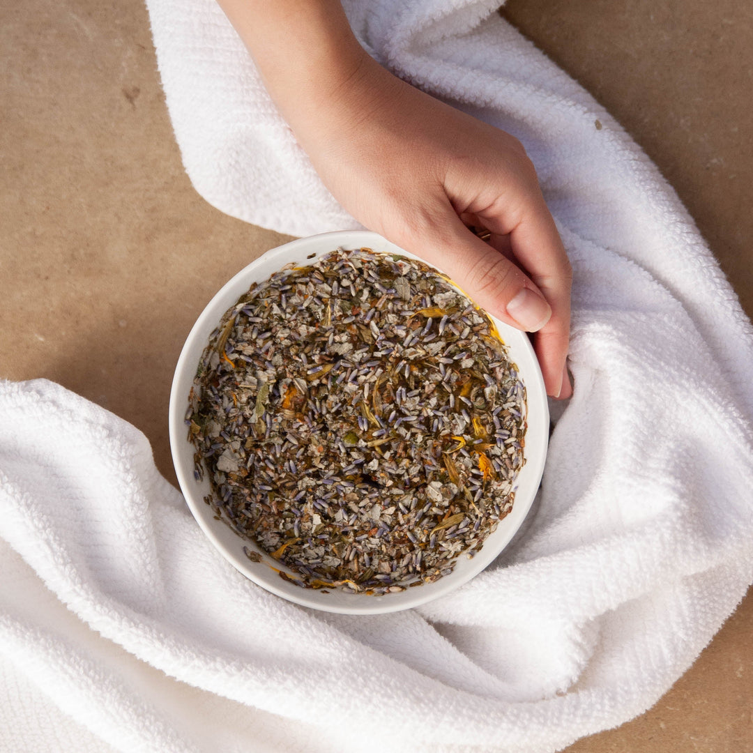 Single-use herbal facial steam blend shown in a clear glass bowl.