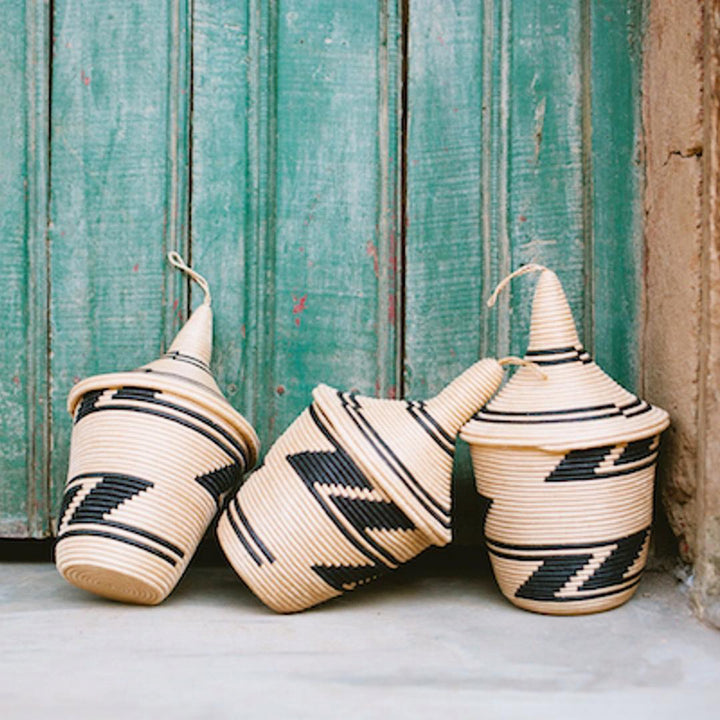Traditional sisal peace basket, handwoven from natural fiber for storage or display.