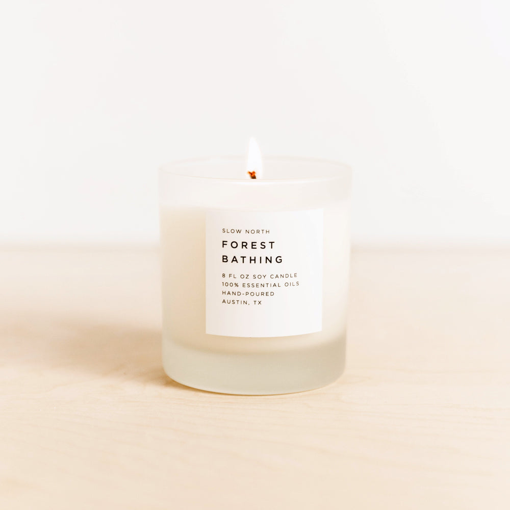 Calm and Grounded Candle Trio with three essential oil-scented candles in glass jars.
