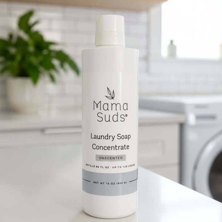 Laundry soap concentrate refill bottle with a green cap and label.