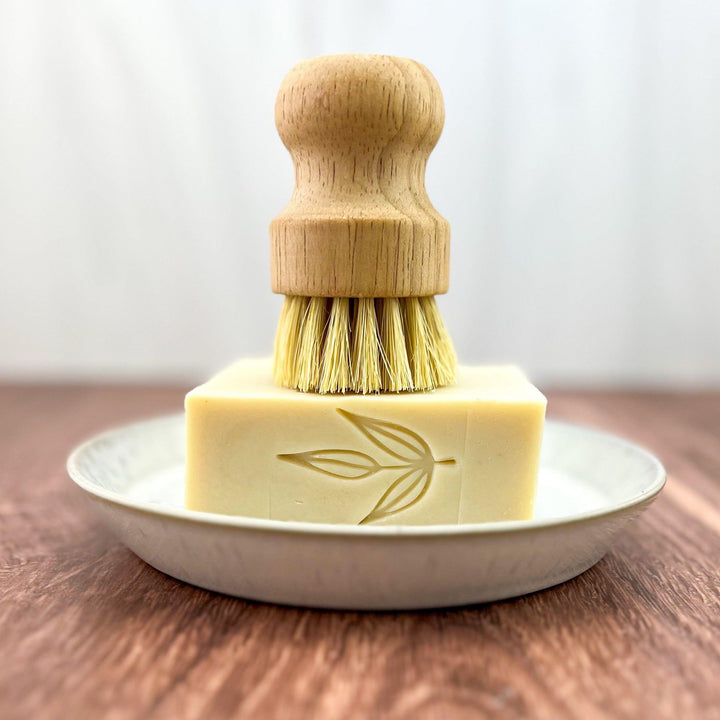 Solid castile dish soap bar for gentle dishwashing.