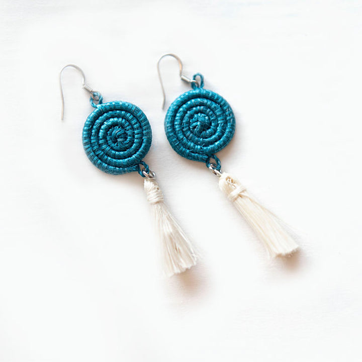 Celestial blue handwoven sisal tassel earrings with white woven accents.