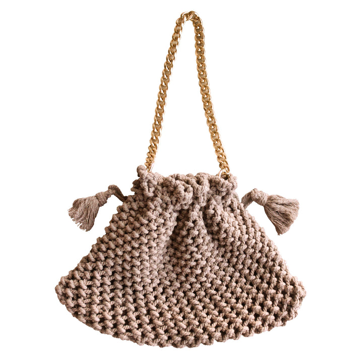Macrame tote bag in toasted beige with woven handles, featuring a natural boho style and intricate knot designs.