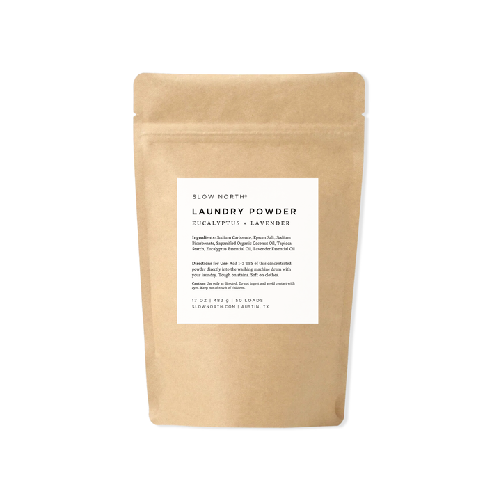 Eucalyptus lavender laundry powder in green and white packaging with botanical design.