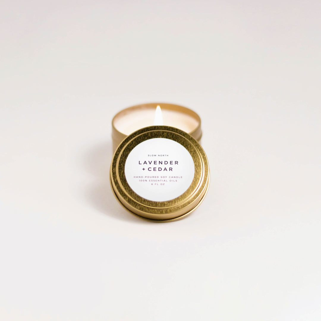 Lavender cedar travel tin candle with soy wax and lavender-cedar botanical design.