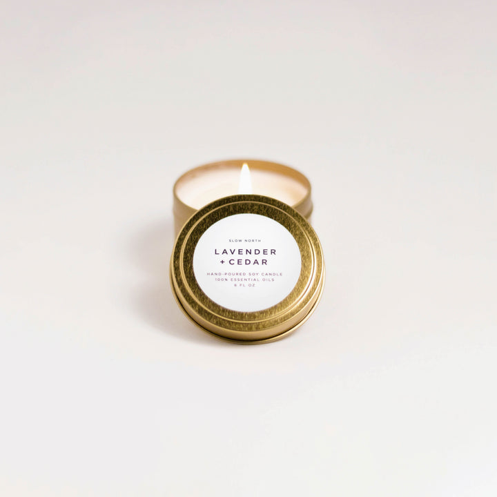 Lavender cedar travel tin candle with soy wax and lavender-cedar botanical design.