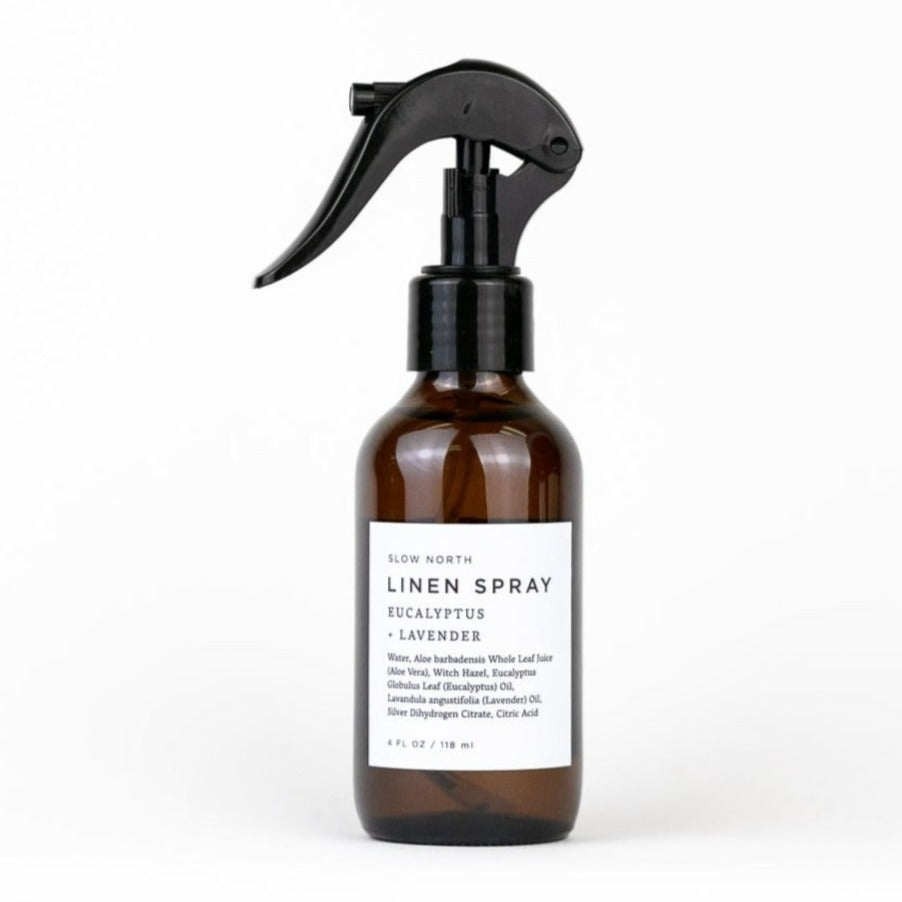Shangri-La linen spray with eucalyptus and lavender in a glass spray bottle.