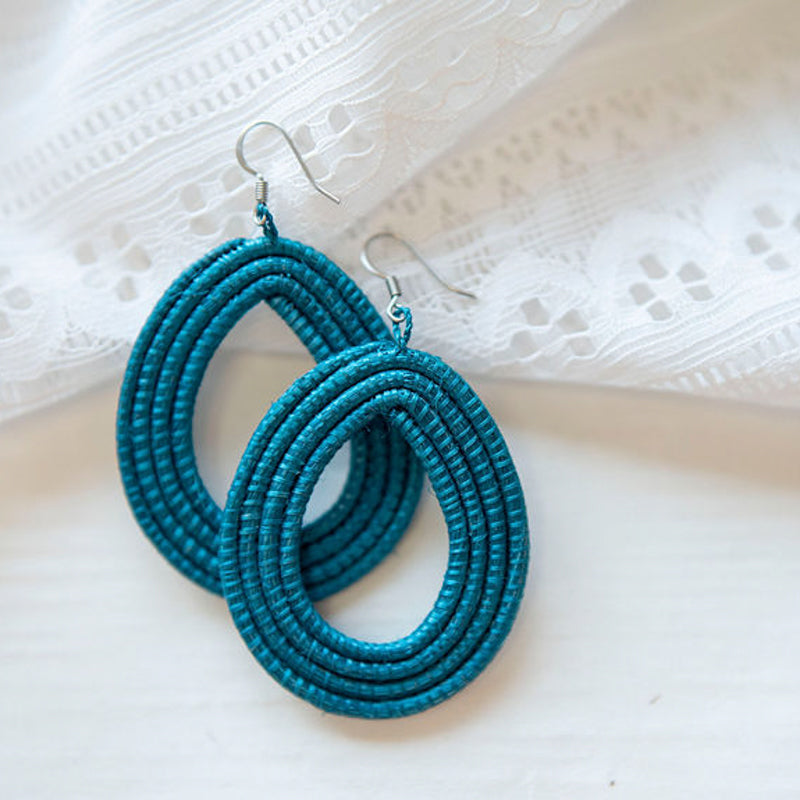Celestial blue woven loop earrings in natural sisal with a textured weave.