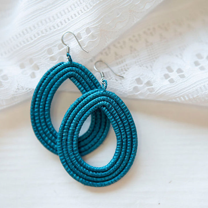 Celestial blue woven loop earrings in natural sisal with a textured weave.