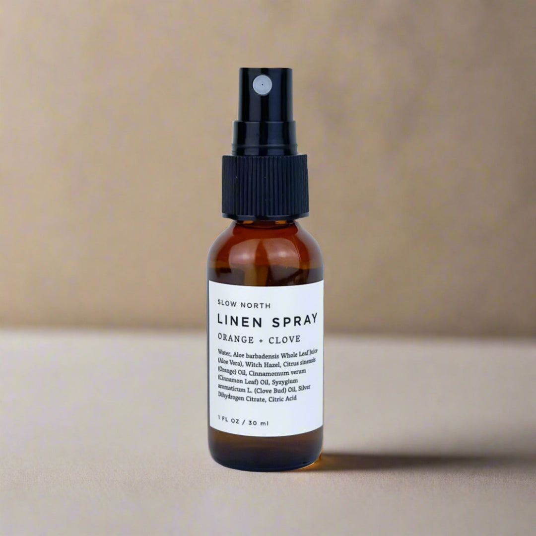 Mini linen spray with sweet orange, clove bud, and cinnamon leaf essential oils.