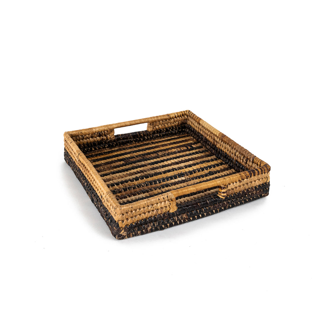 Medium handwoven banana leaf tray with a natural woven leaf pattern.