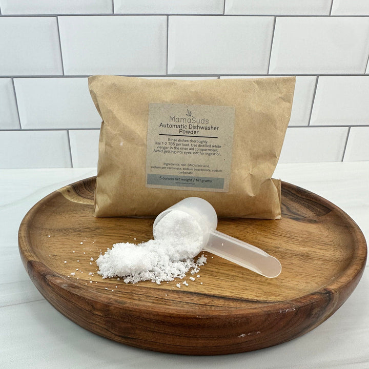 Sample size of natural automatic dishwasher powder in a sealed bag.