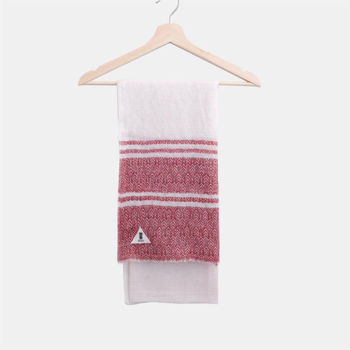 Handwoven cashmere scarf in the Merry design, shown flat to show the weave.
