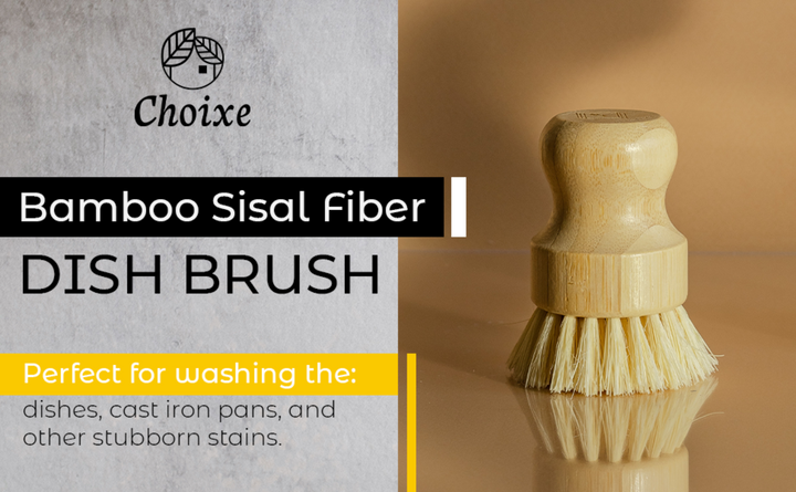Bamboo and sisal dish brush with natural bristles, showing its ergonomic wooden handle and textured bristle surface.