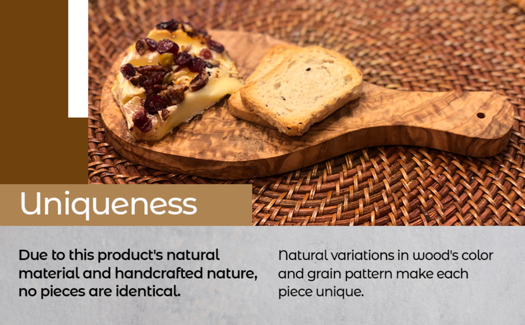 Olive wood cutting board with a Mediterranean handle, showcasing a polished surface and handcrafted design.