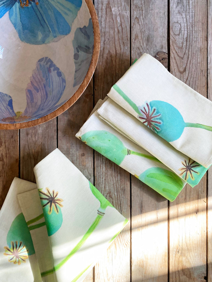 Heavyweight linen-cotton napkin set with a poppy pod design in ecru.
