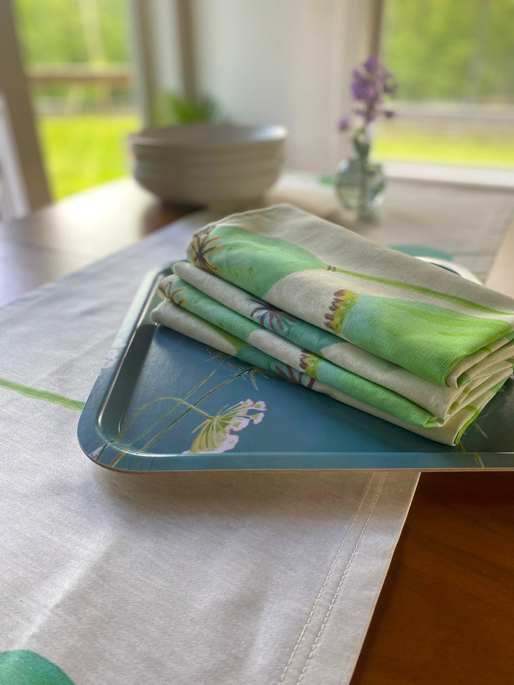 Poppy pod napkins in heavyweight linen-cotton, displayed on a tray.